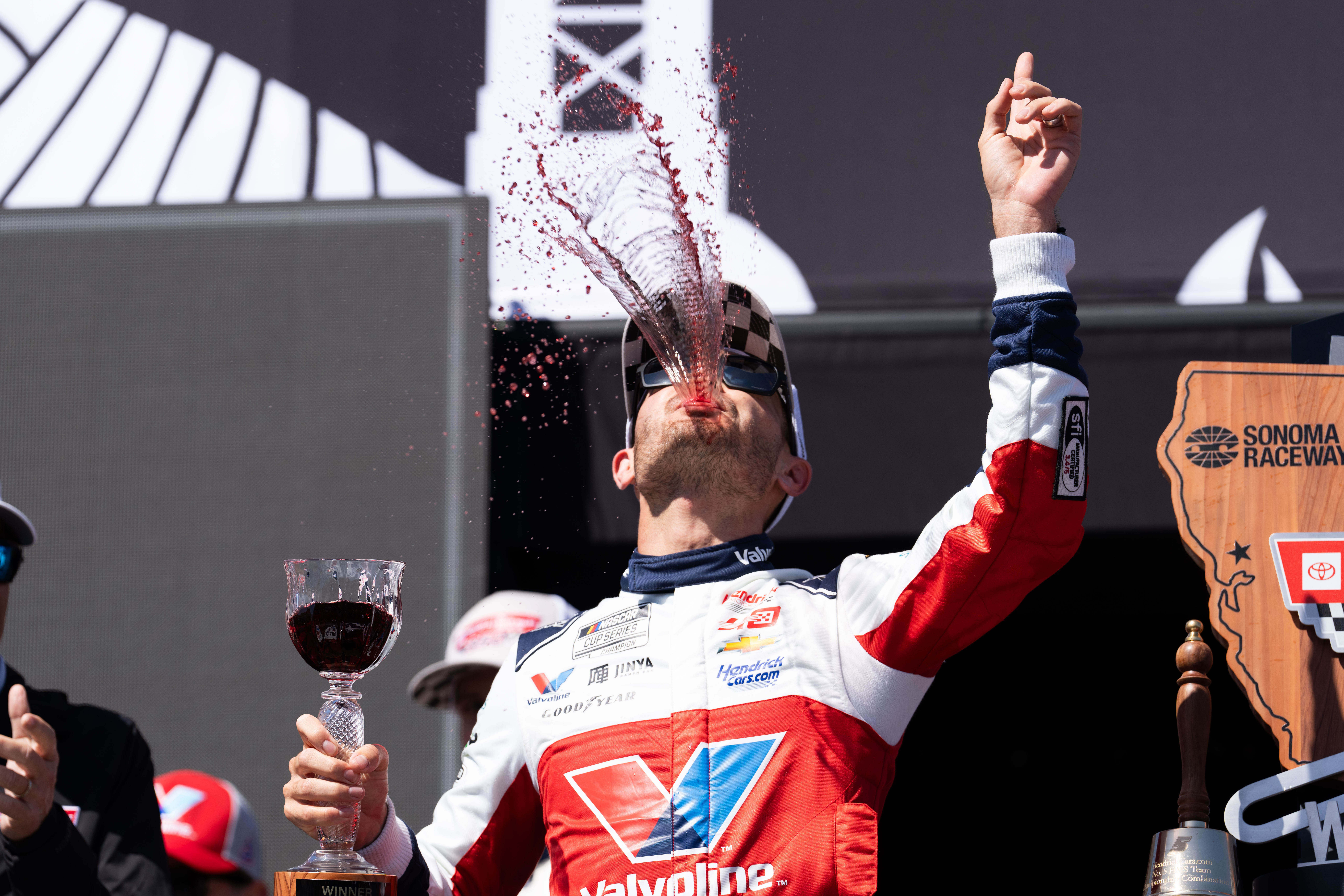Kyle Larson spitting wine after winning the Toyota / Save Mart 350 at Sonoma Raceway. Source: Imagn